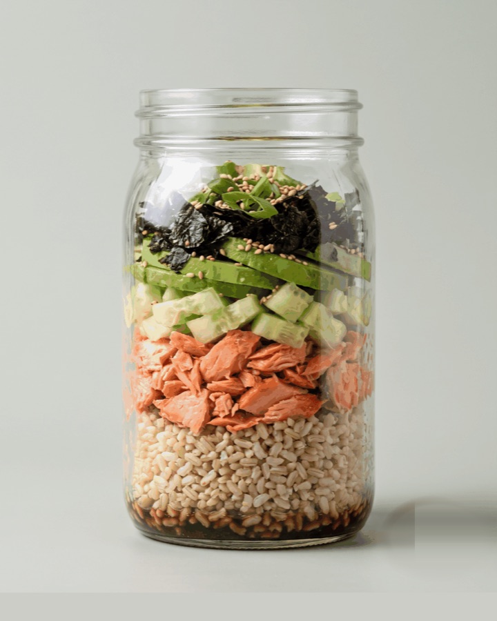 Wild salmon nori rice dinner layered in a glass jar